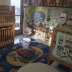 The infant/toddler room is fun, safe and cozy.